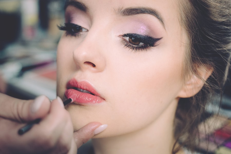 Makeup artist applying makeup to a client